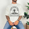 Faith Over Fear Trust In His Plan Comfort Colors T Shirt displayed by a model with tattoos and indoor plants.