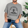Faith Over Fear Trust In His Plan Comfort Colors T Shirt worn by male model holding a cup, featuring a cross and mountain design.