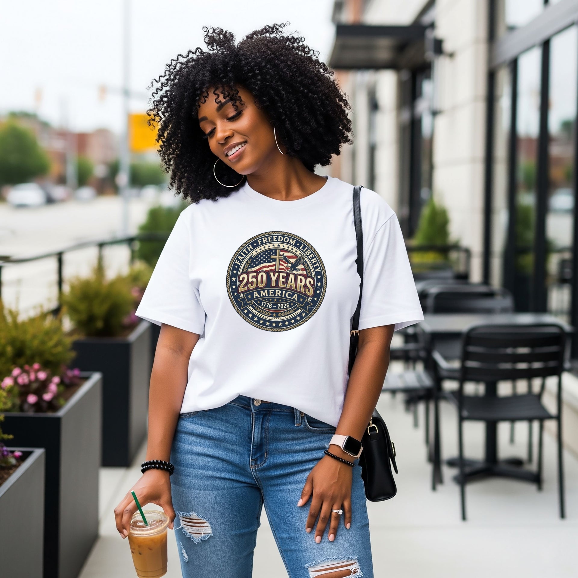 Woman wearing the 250 Years America Badge T-Shirt with vintage badge design and American flag elements.