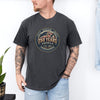 Man wearing a 250 Years America Badge T-Shirt with vintage badge design and American flag inspired elements.