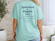 Motherhood Is Kingdom Work T Shirt featuring a heartfelt design on a chalky mint tee.