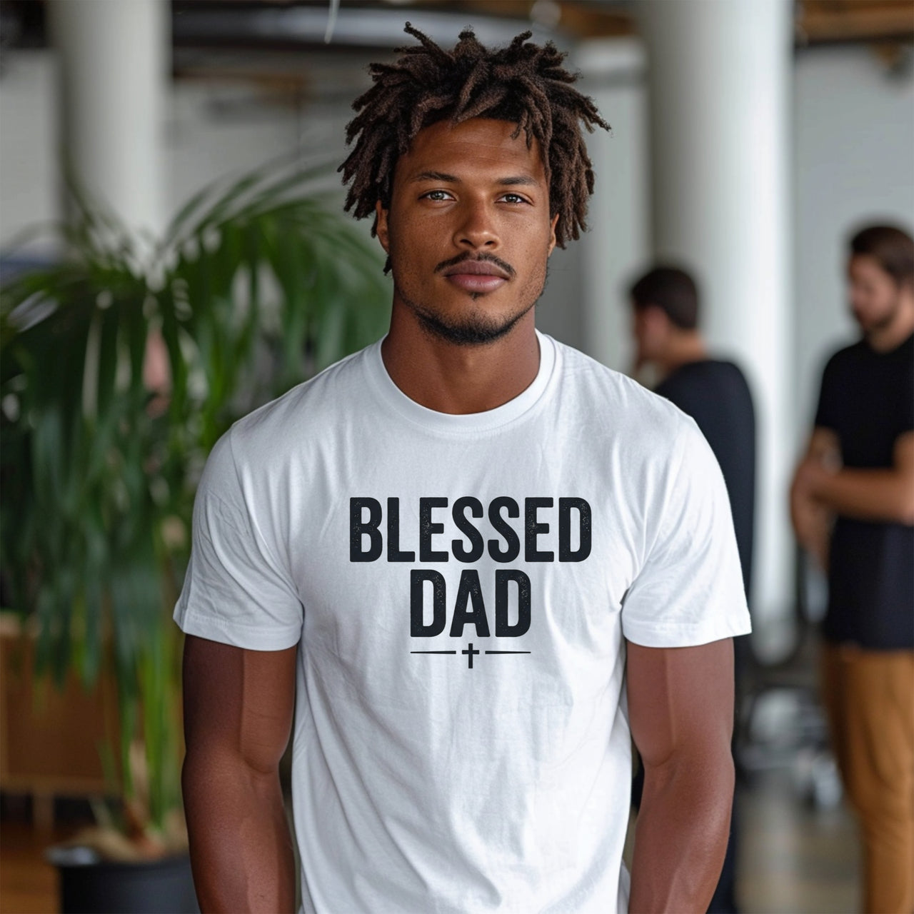 Man wearing a Blessed Dad Cross T Shirt showcasing a bold design, exemplifying faith and fatherhood.