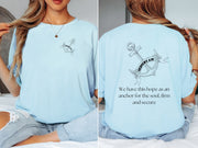Hebrews 6:19 anchor scripture shirt with anchor design and inspirational Bible verse, unisex, light blue color.