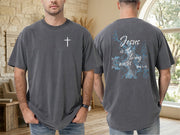 Jesus living water t shirt featuring cross design and colorful text, showcasing a spiritual message on a comfortable garment.