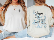 Jesus living water t shirt featuring a cross and scripture design, comfortable garment dyed cotton.