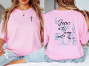 Jesus living water t shirt featuring pink color with scripture design and cross embellishment