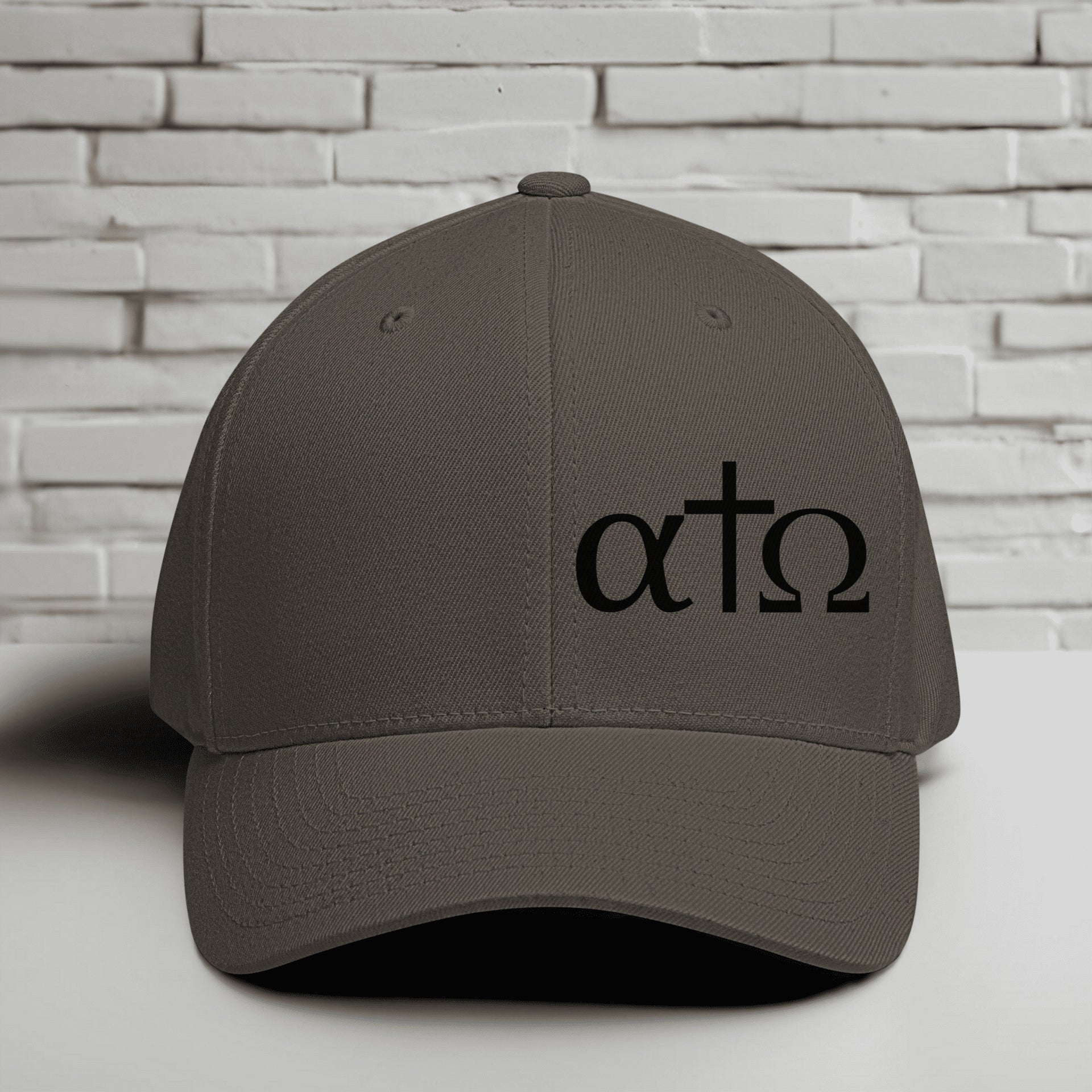 alpha omega cross black hat featuring Greek letters and minimalist design, perfect for faith wear.