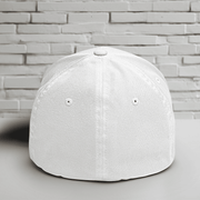 Back view of a white Flexfit hat, showcasing its structured design and clean silhouette.