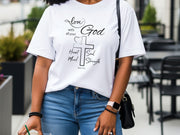 Model wearing a Love God T Shirt featuring Mark 12:30, showcasing faith and stylish design.