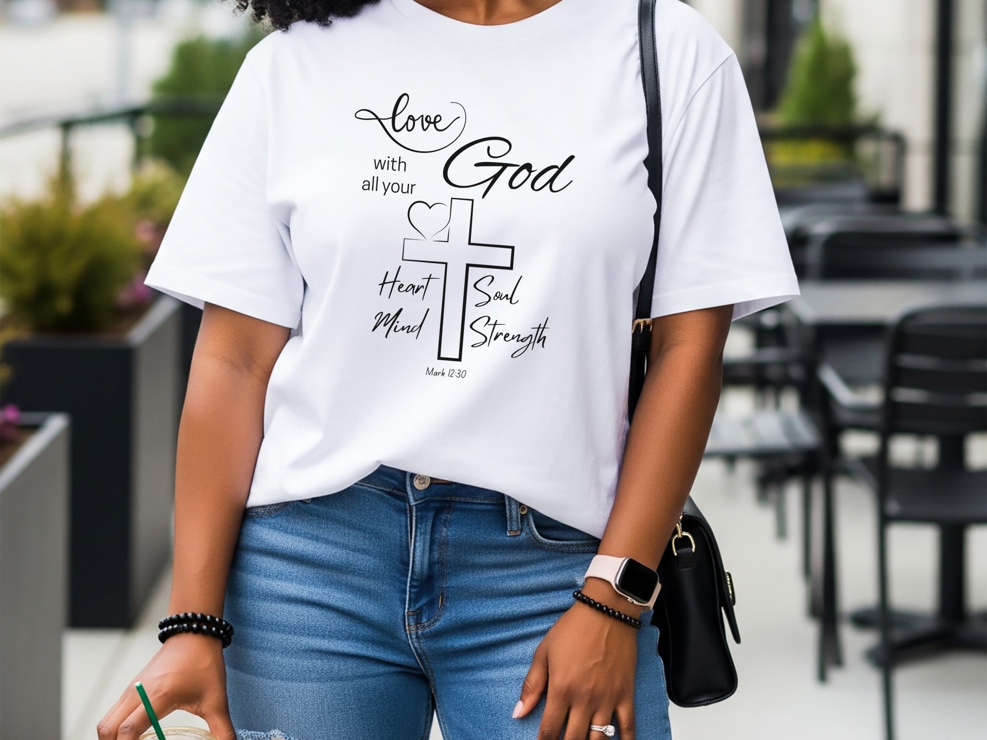 Model wearing a Love God T Shirt featuring Mark 12:30, showcasing faith and stylish design.