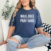Walk Bold Pray Hard Christian Cross T Shirt on a model, showcasing comfort and faith.