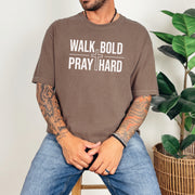Man wearing Walk Bold Pray Hard Christian Cross T Shirt, featuring a relaxed fit and soft cotton fabric.