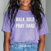 Model wearing Walk Bold Pray Hard Christian cross t shirt, showcasing a confident style and faith-based message.