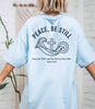 Peace Be Still T Shirt featuring waves and a cross design, perfect for conveying calm and comfort.
