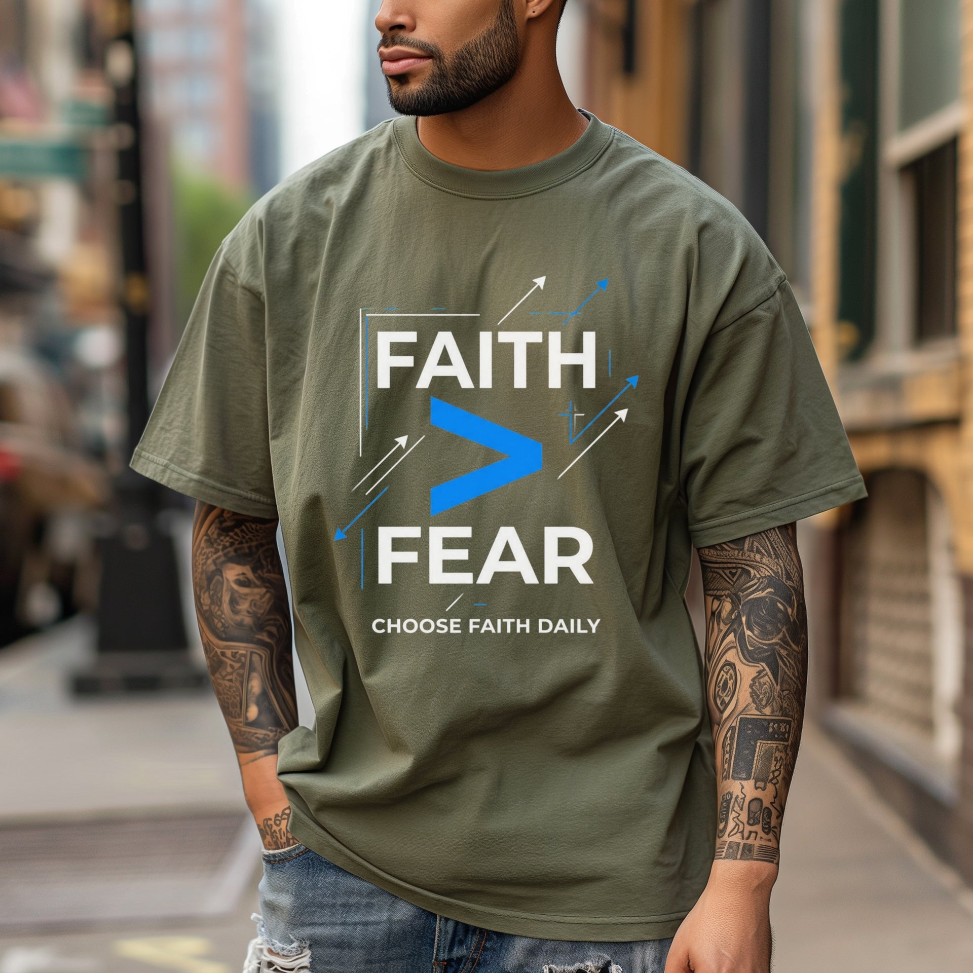 Man wearing a Faith > Fear T shirt in olive green, promoting faith over fear t shirt with stylish design.