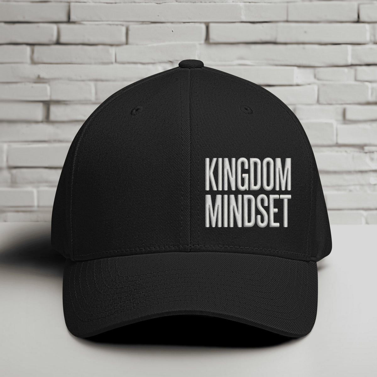 Flexfit Kingdom Mindset hat featuring clean white embroidery on a black cap, perfect for casual wear and faith-based style.