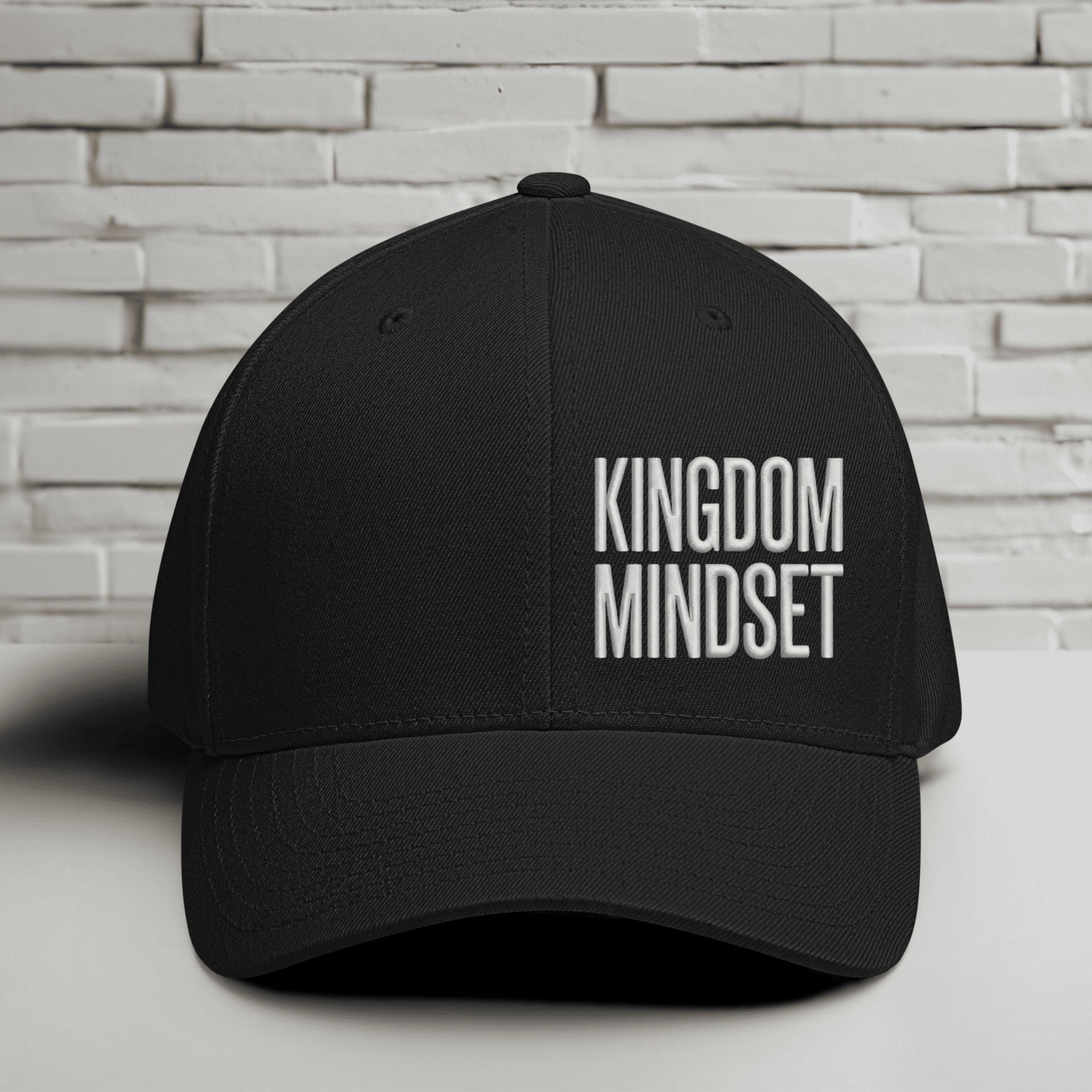 Flexfit Kingdom Mindset hat featuring clean white embroidery on a black cap, perfect for casual wear and faith-based style.