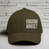 Flexfit Kingdom Mindset hat in olive green with white embroidery on a textured background.