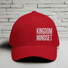 Flexfit Kingdom Mindset hat in red with white embroidery on a minimalist background.