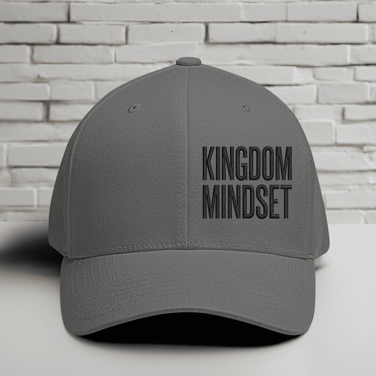Flexfit Kingdom Mindset Embroidered Hat in grey, showcasing bold lettering, perfect for casual wear and workouts.