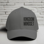 Flexfit Kingdom Mindset Embroidered Hat in grey, showcasing bold lettering, perfect for casual wear and workouts.