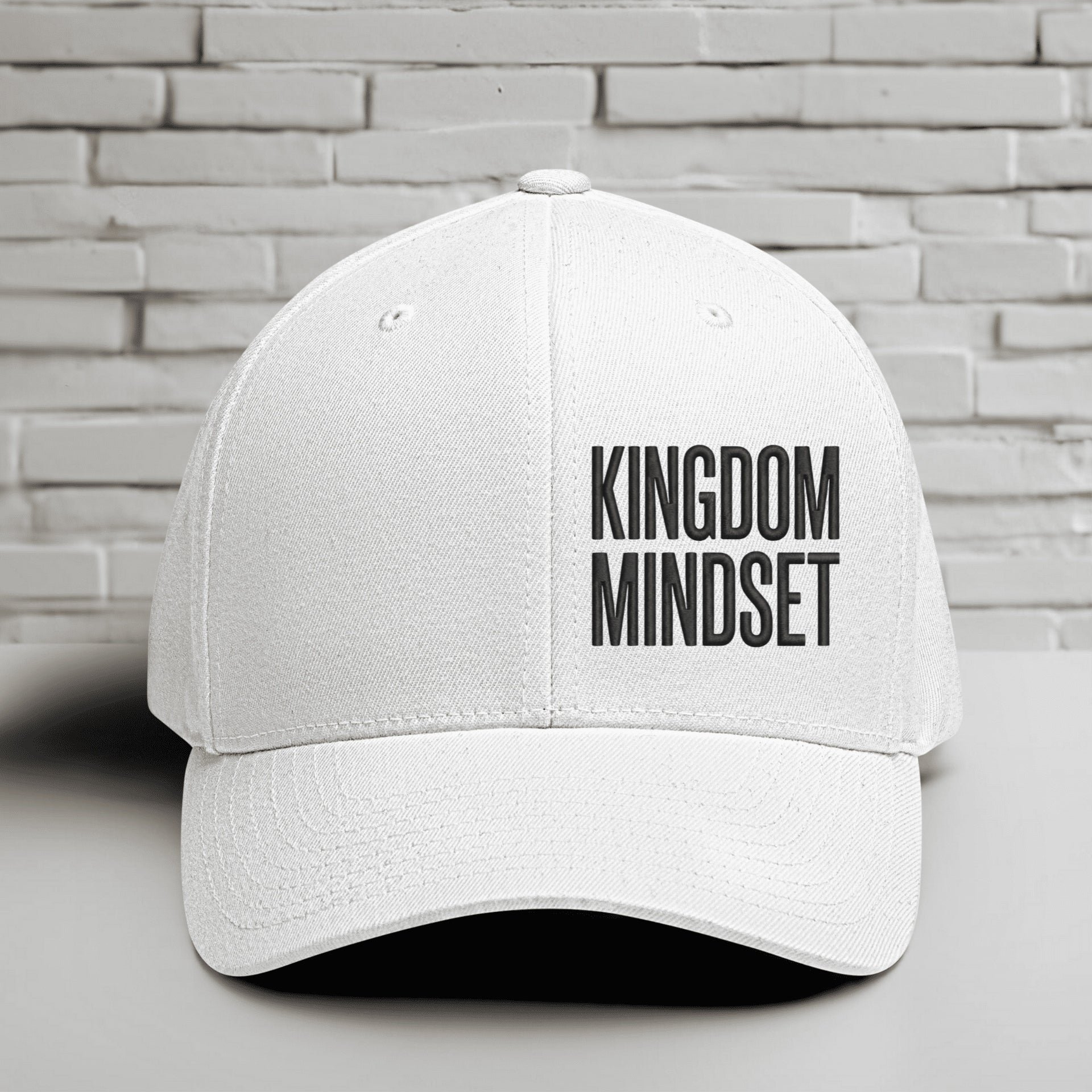 Flexfit Kingdom Mindset embroidered faith hat in white with bold lettering, perfect for casual and active wear.