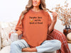 Pumpkin Spice and the Spirit of Christ t-shirt in yam color worn by a woman holding a coffee mug, perfect for autumn.