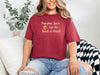 Pumpkin Spice and the Spirit of Christ T-Shirt in Chili color worn by a model, celebrating faith and autumn.