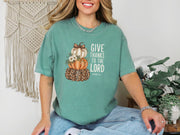 Give thanks to the lord t-shirt in light green with pumpkin design, perfect for celebrating gratitude and faith.