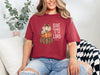 Give Thanks to the Lord t-shirt in chili color featuring pumpkin graphic design and inspiring quote by Psalm 136:1.