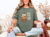 Give Thanks to the Lord T-shirt in moss color featuring pumpkin graphic, perfect for expressing faith and gratitude.