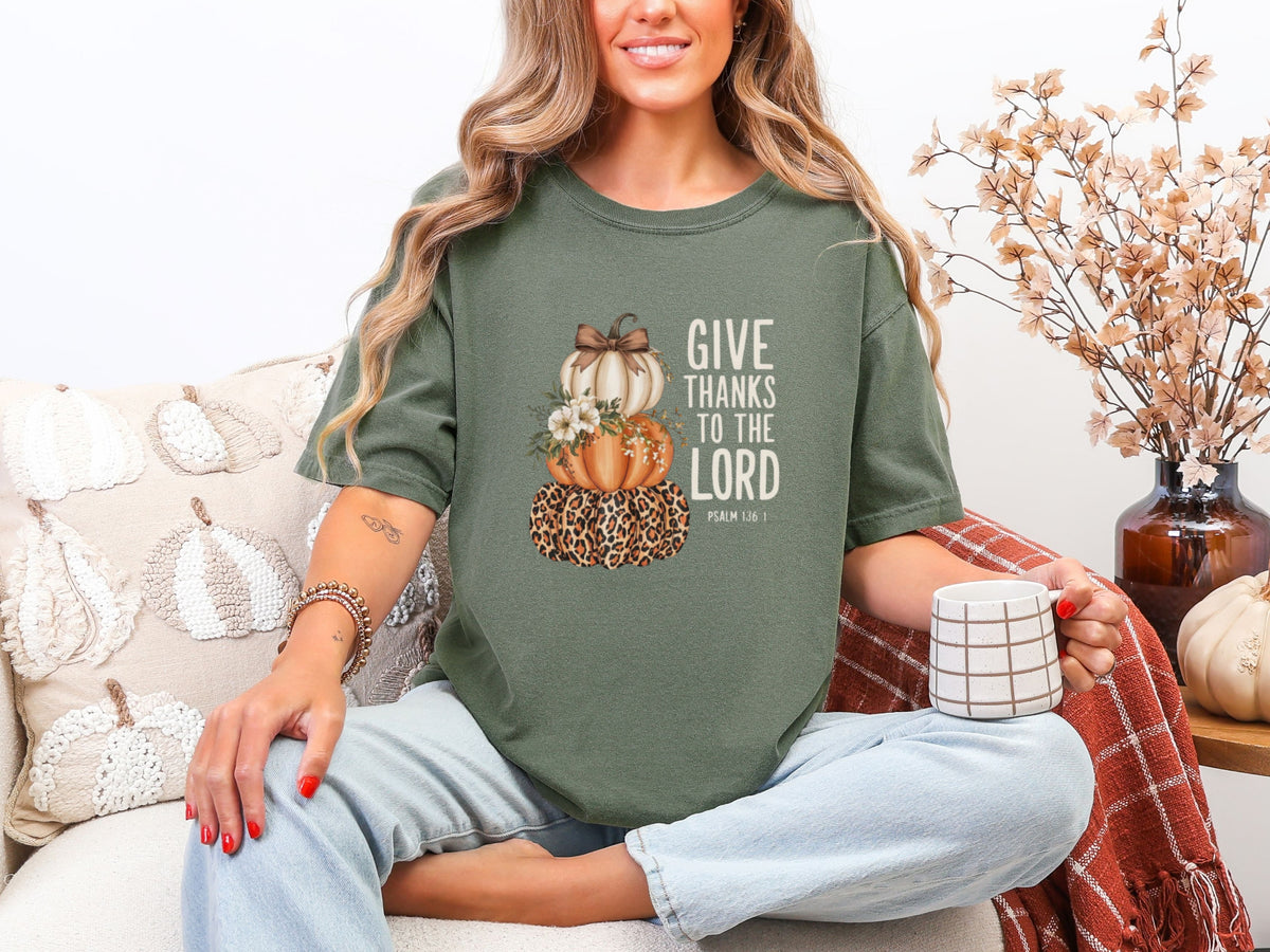 Give Thanks to the Lord T-shirt in moss color featuring pumpkin graphic, perfect for expressing faith and gratitude.