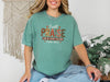 Light green Christian graphic tee praise with uplifting text I Will Praise Him in Every Season.