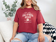 Woman wearing a Chili Are You Foll-o-ween Jesus t-shirt with a humorous design for Halloween celebration.