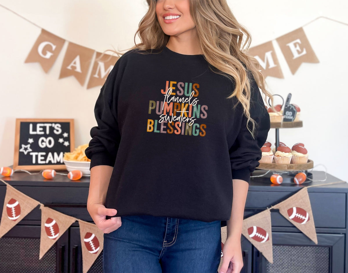 Christian fall sweatshirt featuring Jesus, Flannels, Pumpkins, Sweaters, Blessings design on a black crewneck.