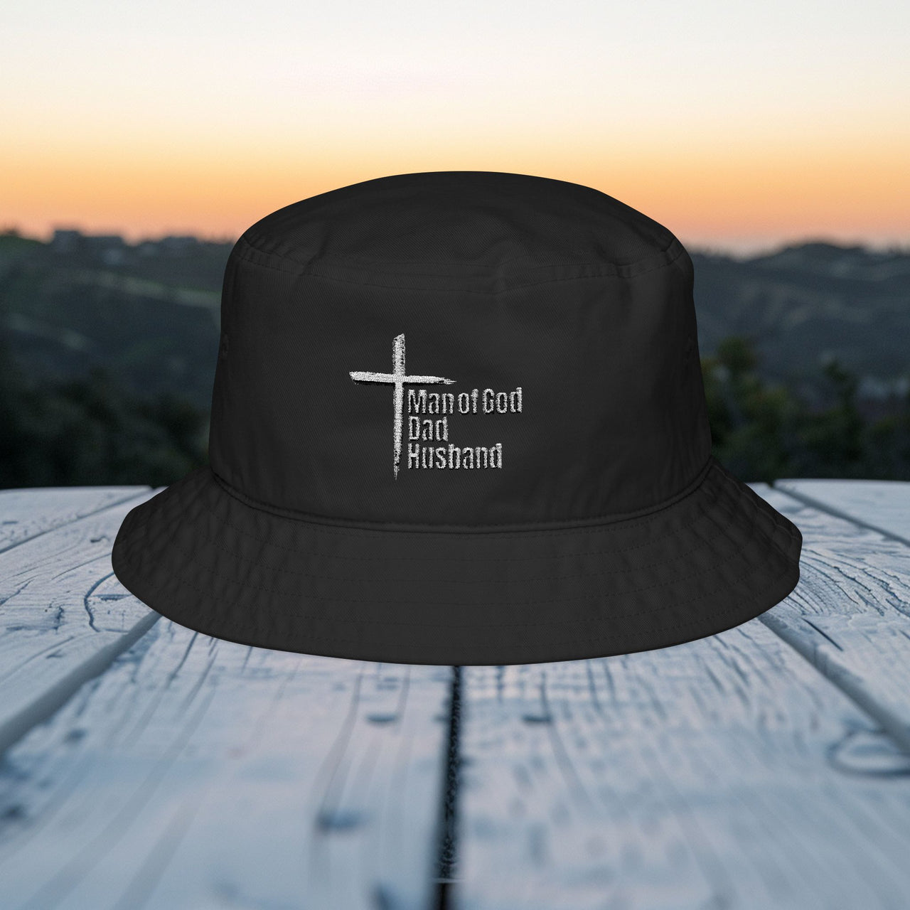 Man of God embroidered bucket hat with cross design, perfect for expressing faith and identity.