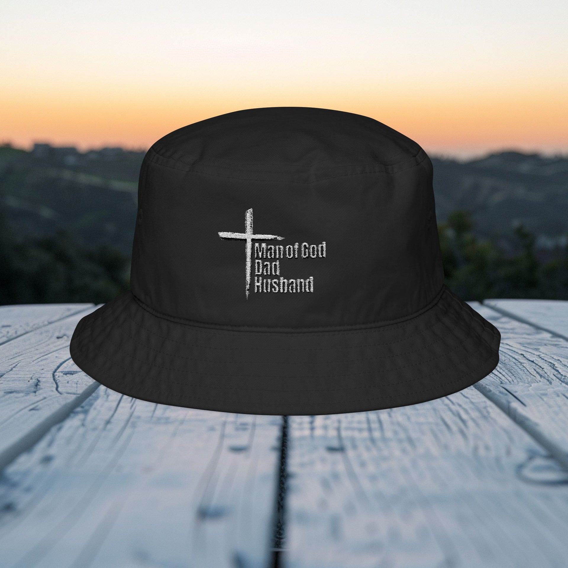Man of God embroidered bucket hat with cross design, perfect for expressing faith and identity.